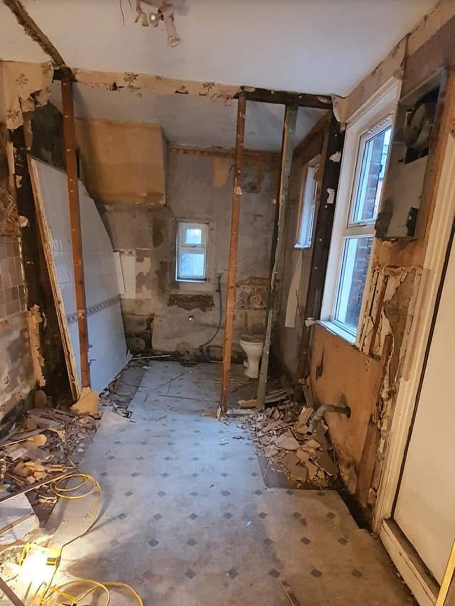 Room gutted back to the studs during a kitchen and bathroom renovation